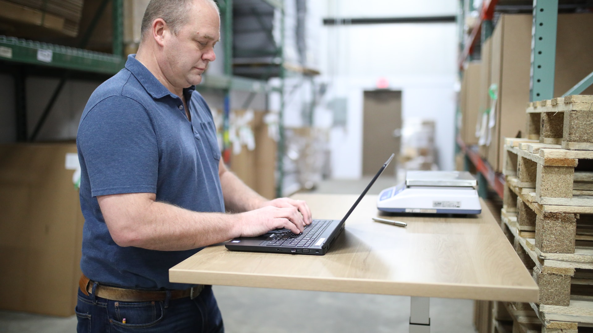 Manager filling out a warehouse induction checklist